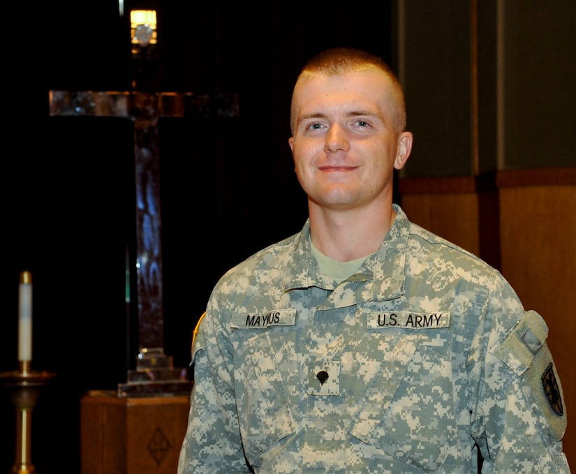 U.S. Army Spc. Stephen Maynus, Fort Eustis chaplain assistant, helps chaplains with daily tasks and provides spiritual guidance to Fort Eustis leadership. Maynus said even though he does not wear the cross on his uniform like his chaplain, he shares the same pride in serving others. (U.S. Air Force photo by Staff Sgt. Wesley Farnsworth/Released)