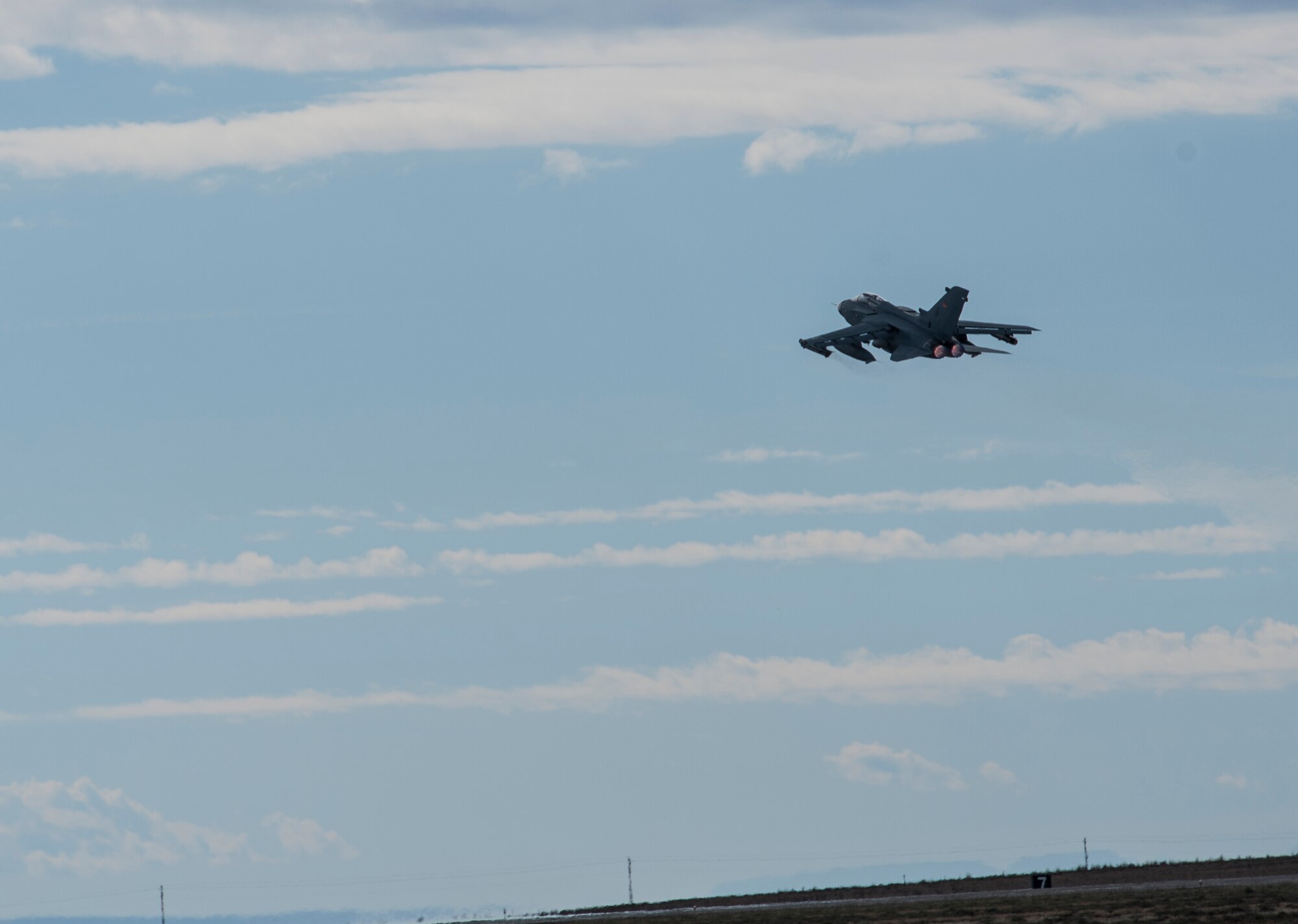 A German Air Force AG-51 Tornado takes to the sky for an Exercise Mountain Roundup 2013 orientation flight at Mountain Home Air Force Base, Idaho, Oct. 1, 2013. The Tornados will be at Mountain Home from Sept. 30 through Oct. 19 for the exercise, which is part of the German Air Force Tornado Fighter Weapons Instructor Course Mission Employment (ME) Phase. (U.S. Air Force photo by Master Sgt. Kevin Wallace/RELEASED)