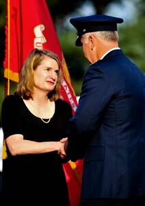 Molly Ward, mayor of Hampton, Va., thanks U.S. Air Force Col. John Allen, 633rd Air Base Wing commander, during a remembrance ceremony at Godnold’s Hope Park, Sept. 11, 2013. Ward, was appointed as a special assistant to the president and deputy director for the Office of Intergovernmental Affairs Sept. 30, and will step down as mayor Oct. 4. (U.S. Air Force photo by Staff Sgt. Jarad A. Denton/Released)