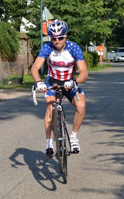 1st Lt. John ShalekBriski, 92nd Air Refueling Squadron pilot, completes an 81 mile race during the 2013 Conseil International du Sport Militaire 23rd World Military Cycling Championship held at Leopoldsburg, Belgium, Sept. 4, 2013. ShalekBriski took 20th place with over 200 participants that represented over ten nations. (Courtesy photo)