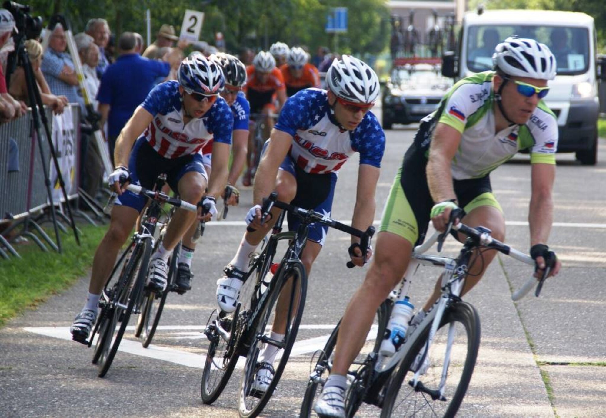 1st Lt. Matthew ShalekBriski, 92nd Air Refueling Squadron pilot, races along with his teammates during the 2013 Conseil International du Sport Militaire 23rd World Military Cycling Championship held at Leopoldsburg, Belgium, Sept. 4, 2013. The participants of the race were all military members from over the world. (Courtesy photo)