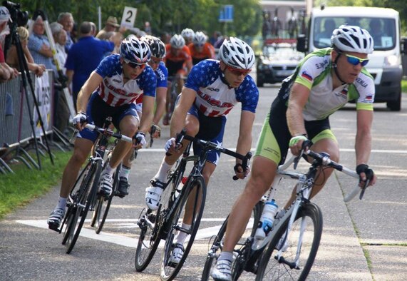 1st Lt. John ShalekBriski, 92nd Air Refueling Squadron pilot, races along with his teammates during the 2013 Conseil International du Sport Militaire 23rd World Military Cycling Championship held at Leopoldsburg, Belgium, Sept. 4, 2013. The participants of the race were all military members from over the world. (Courtesy photo)