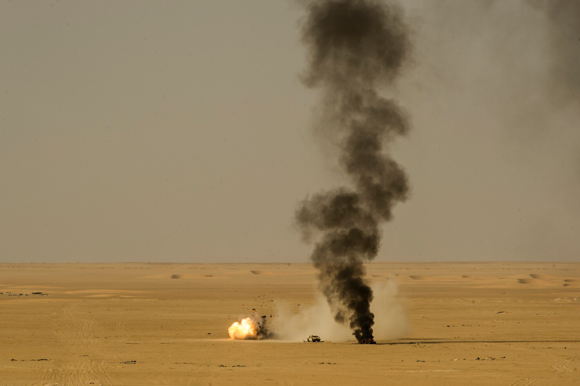 The 82nd Expeditionary Air Support Operations Squadron conducts a Joint Air Attack Team live-fire exercise at an undisclosed location in Southwest Asia, Sept. 18, 2013. A JAAT is where both fixed wing and rotary wing assets all fire in to the same area. "It is important is because it masses fires and gives a shock to the enemy." (U.S. Air Force photo by Staff Sgt. Stephany Richards)
