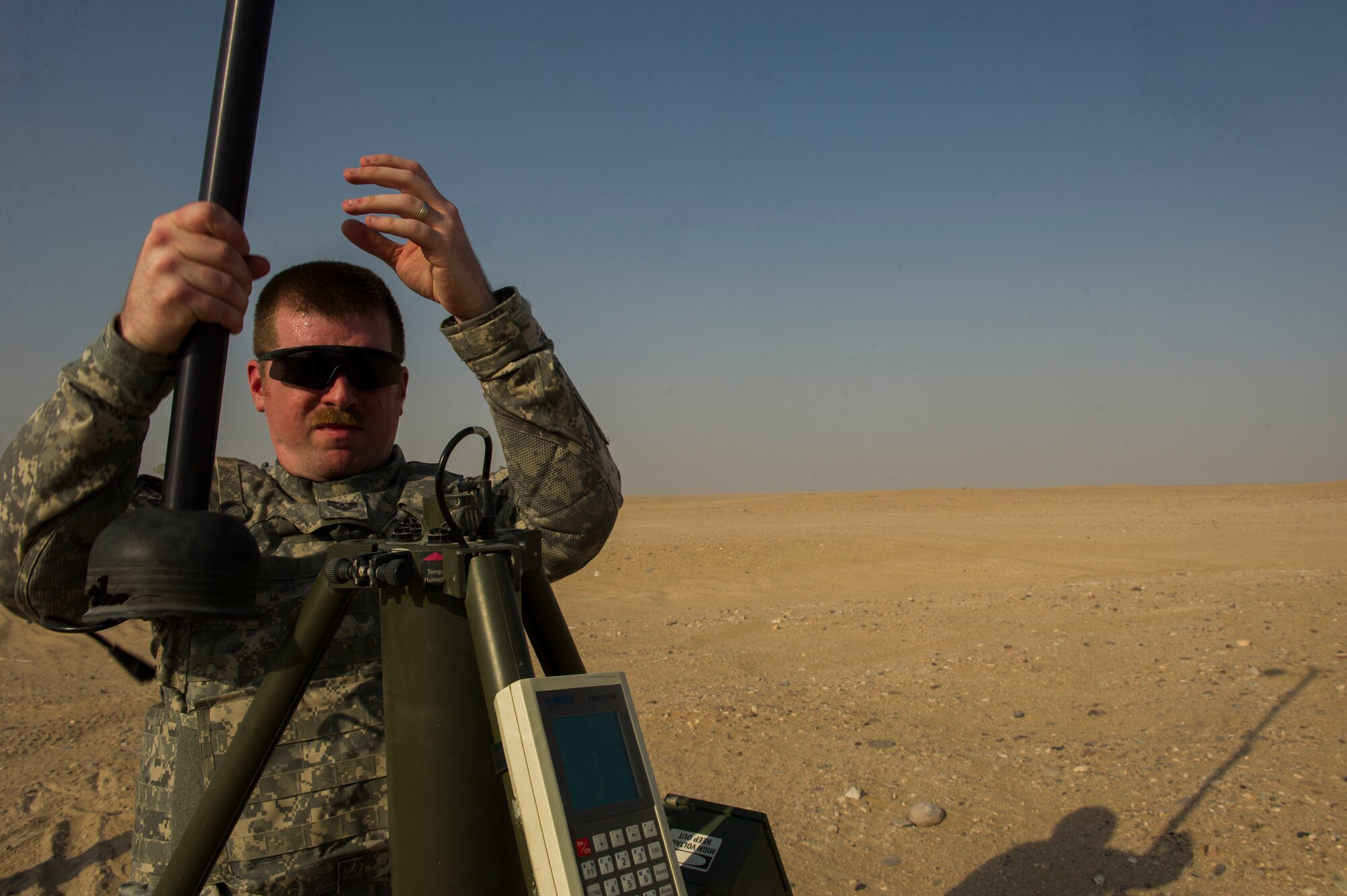 U.S. Air Force Tech. Sgt. James Foutz, 82nd Expeditionary Air Support Operations Squadron combat weather, disassembles the mobile weather sensing equipment after a live-fire Joint Air Attack Team exercise at an undisclosed location in Southwest Asia, Sept. 18, 2013. "The equipment allows us to do our job in a tactical weather environment." (U.S. Air Force photo by Staff Sgt. Stephany Richards)
