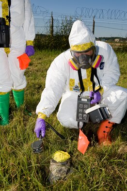 Staff Sgt. Salvador Gruny, 8th Medical Group Bioenvironmental Engineering technician, scans the area for radioactive particles during an exercise at Kunsan Air Base, Republic of Korea, Sept. 26, 2013. The exercise helped prepare several agencies, including emergency management, explosive ordnance disposal and bioenvironmental, by testing their skills. (U.S. Air Force photo by Senior Airman Armando A. Schwier-Morales/Released) 