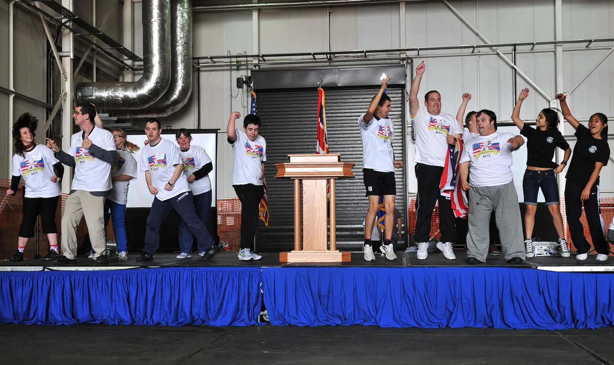 Joan Mann Special Sports Day athletes dance Sept. 28, 2013, on RAF Mildenhall, England. The sports day is designed for special-needs adults and children of England. (U.S. Air Force photo by Airman 1st Class Kyla Gifford/Released)