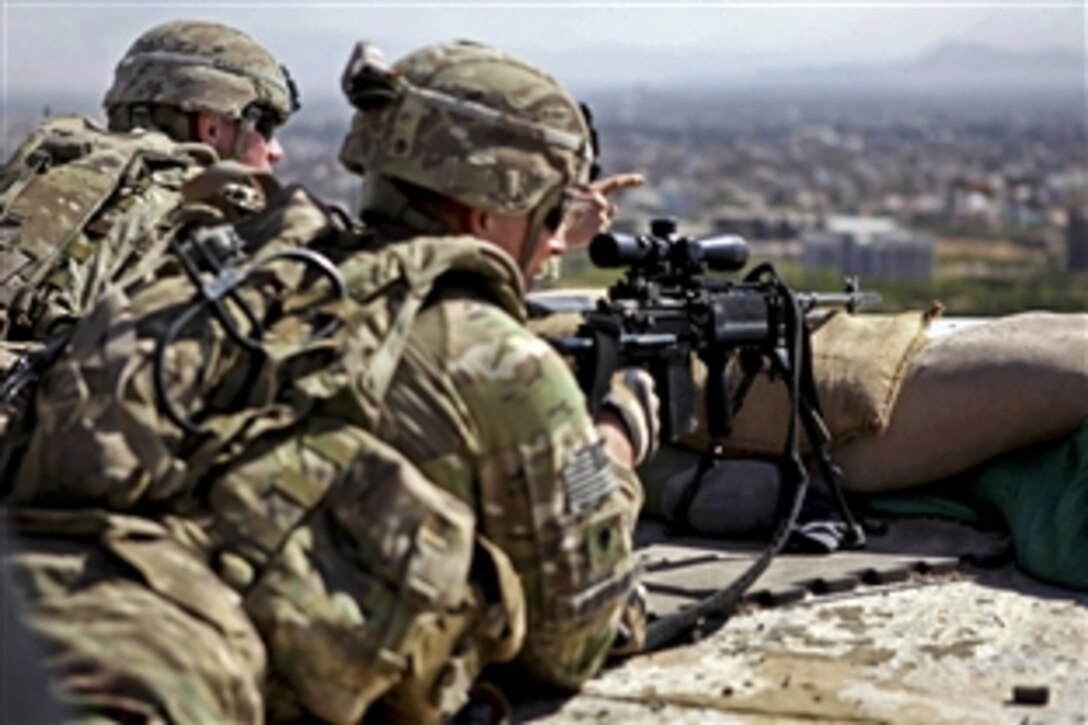 U.S. Army 1st Sgt. Sean Allison, left, and U.S. Army Ryan Skeffington provide security on the roof of the U.S. Consulate in Herat city in Afghanistan’s Herat province, Sept. 19, 2013. Allison and Skeffington are assigned to the 1st Cavalry Division's Company D, 1st Battalion, 5th Cavalry Regiment, 2nd Brigade Combat Team.