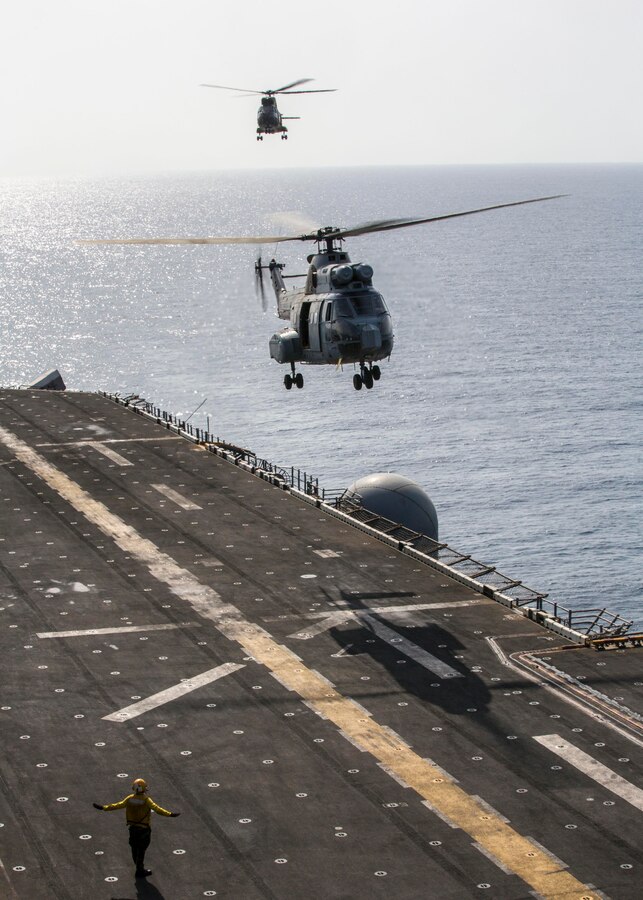 French aircraft land aboard the USS Kearsarge (LHD 3), at sea, Sept. 30, 2013. The 26th Marine Expeditionary Unit (MEU) is a Marine Air-Ground Task Force forward-deployed to the U.S. 5th and 6th Fleet areas of responsibility aboard the Kearsarge Amphibious Ready Group serving as a sea-based, expeditionary crisis response force capable of conducting amphibious operations across the full range of military operations. (U.S. Marine Corps photo by Sgt. Christopher Q. Stone, 26th MEU Combat Camera/Released)