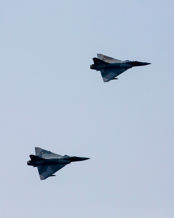 French Mirage 2000D jet fighters perform a show of force across the port side of the USS Kearsarge (LHD 3), at sea, Sept. 30, 2013. The 26th Marine Expeditionary Unit (MEU) is a Marine Air-Ground Task Force forward-deployed to the U.S. 5th and 6th Fleet areas of responsibility aboard the Kearsarge Amphibious Ready Group serving as a sea-based, expeditionary crisis response force capable of conducting amphibious operations across the full range of military operations. (U.S. Marine Corps photo by Sgt. Christopher Q. Stone, 26th MEU Combat Camera/Released)