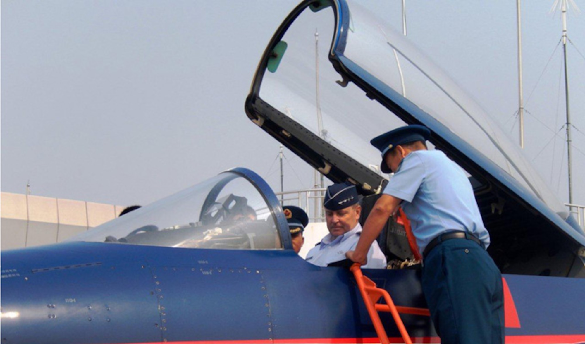 Air Force Chief of Staff Gen. Mark A. Welsh III receives an orientation of a People's Liberation Army Air Force J-10 fighter Sept. 27, 2013, at Nanyuan Air Base, China. Welsh, along with Gen. "Hawk" Carlisle and Chief Master Sgt. of the Air Force James A. Cody, visited with various military leaders as part of a weeklong visit to China.