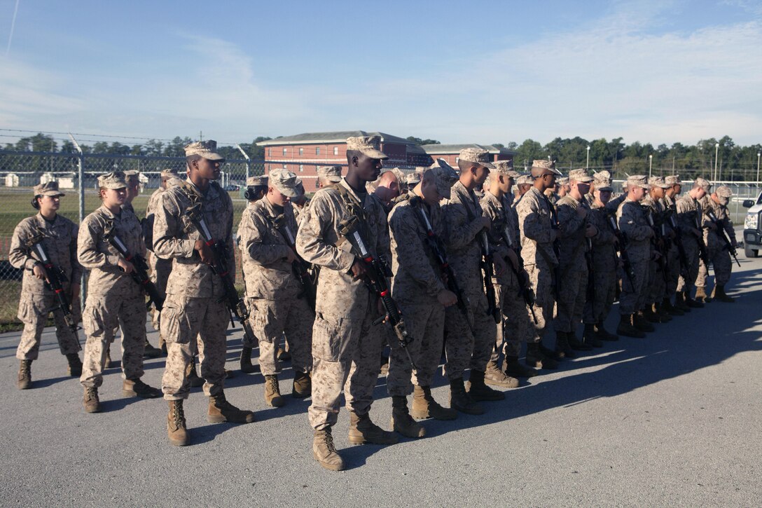 Marines with 3rd platoon, Company I, Marine Combat Training Battalion, await the orders of their combat instructors at the armory aboard Camp Geiger, Sept. 24. Each company has four platoons of Marines. 