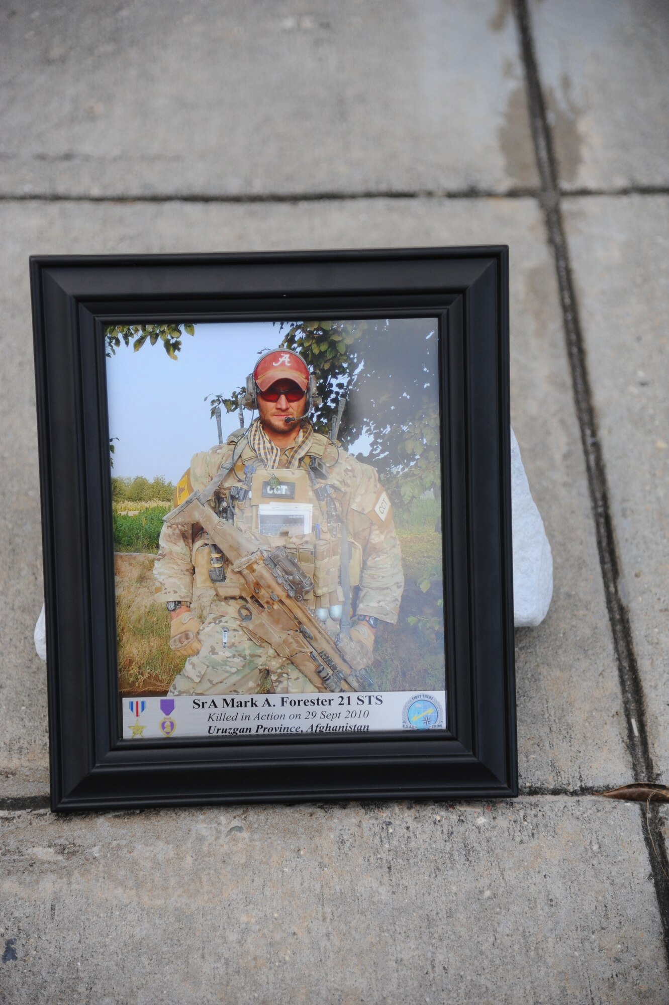 Senior Airman Mark Forester, former combat controller, who was killed in action on Sept. 29, 2010, was honored by members of the 334th Training Squadron combat controllers and the 335th Training Squadron special operations weather team as they held a memorial physical training session Sept. 27, 2013, at Keesler Air Force Base, Miss. (U.S. Air Force photo by Kemberly Groue)