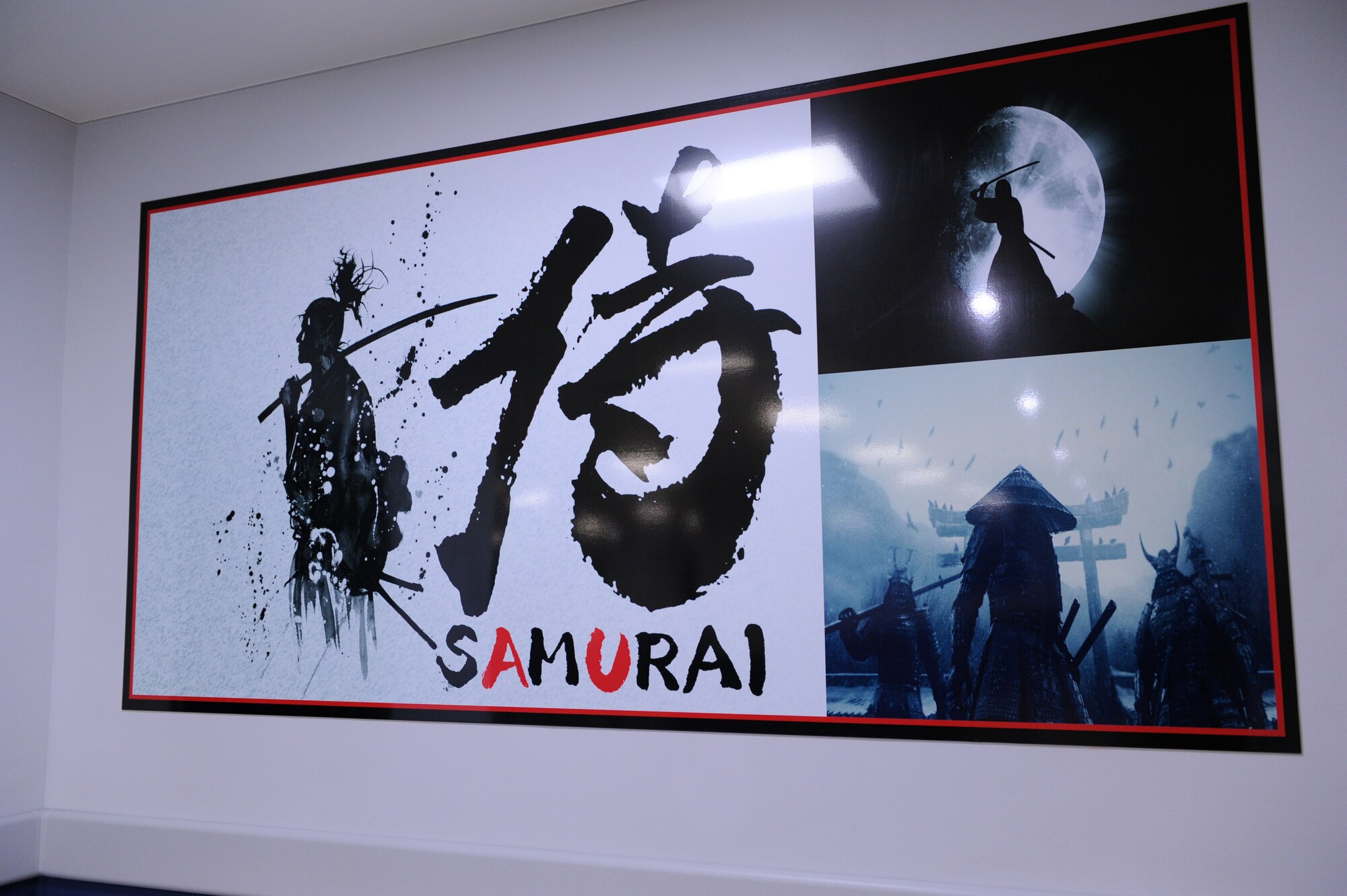 Samurai artwork is on display in the newly renovated Samurai Lounge at the Kadena Passenger Terminal on Kadena Air Base, Japan, Oct. 1, 2013. The Samurai Lounge underwent renovations to improve the quality of the building. Some of the renovations made were updating the heating, ventilation and air conditioning system, adding phone booths and charging stations for laptops and electronics, and restrooms. (U.S. Air Force photo by Airman 1st Class Hailey R. Davis)