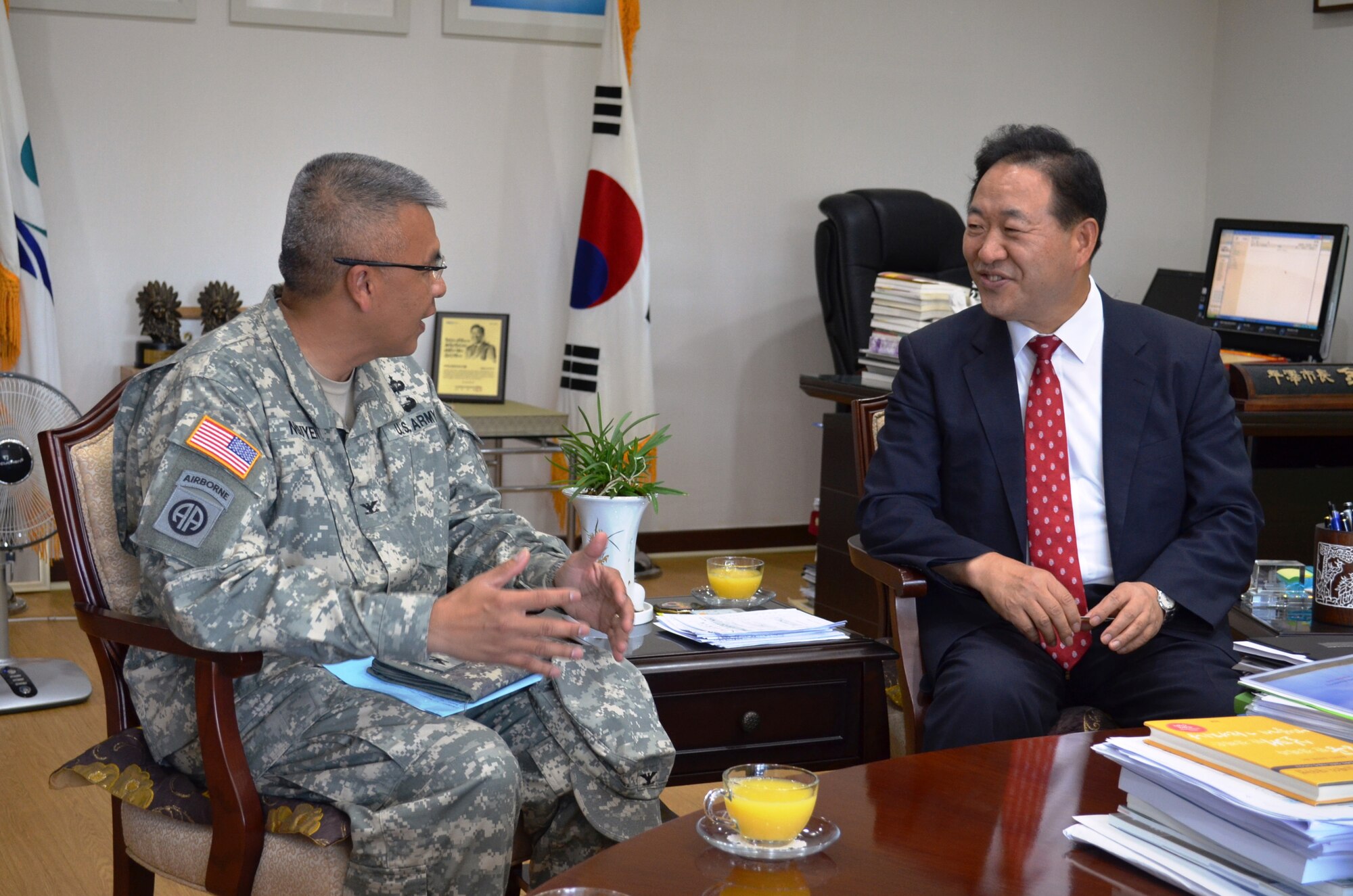 OSAN AIR BASE – Army Col. Thomas Nguyen, commander of the 35th Air Defense Artillery Brigade, visits with Kim, Sun-Ki, mayor of Pyongtaek City, at the mayor’s office, Oct. 1, 2013. Nguyen and Kim spoke for the first time together concerning future plans for the Republic of Korea-U.S. Friendship Counsel, designed to strengthen bonds between the local populace and U.S. Soldiers.
(U.S. Army Photo by Spc. Shawn Denham, PAO, 35th ADA)
