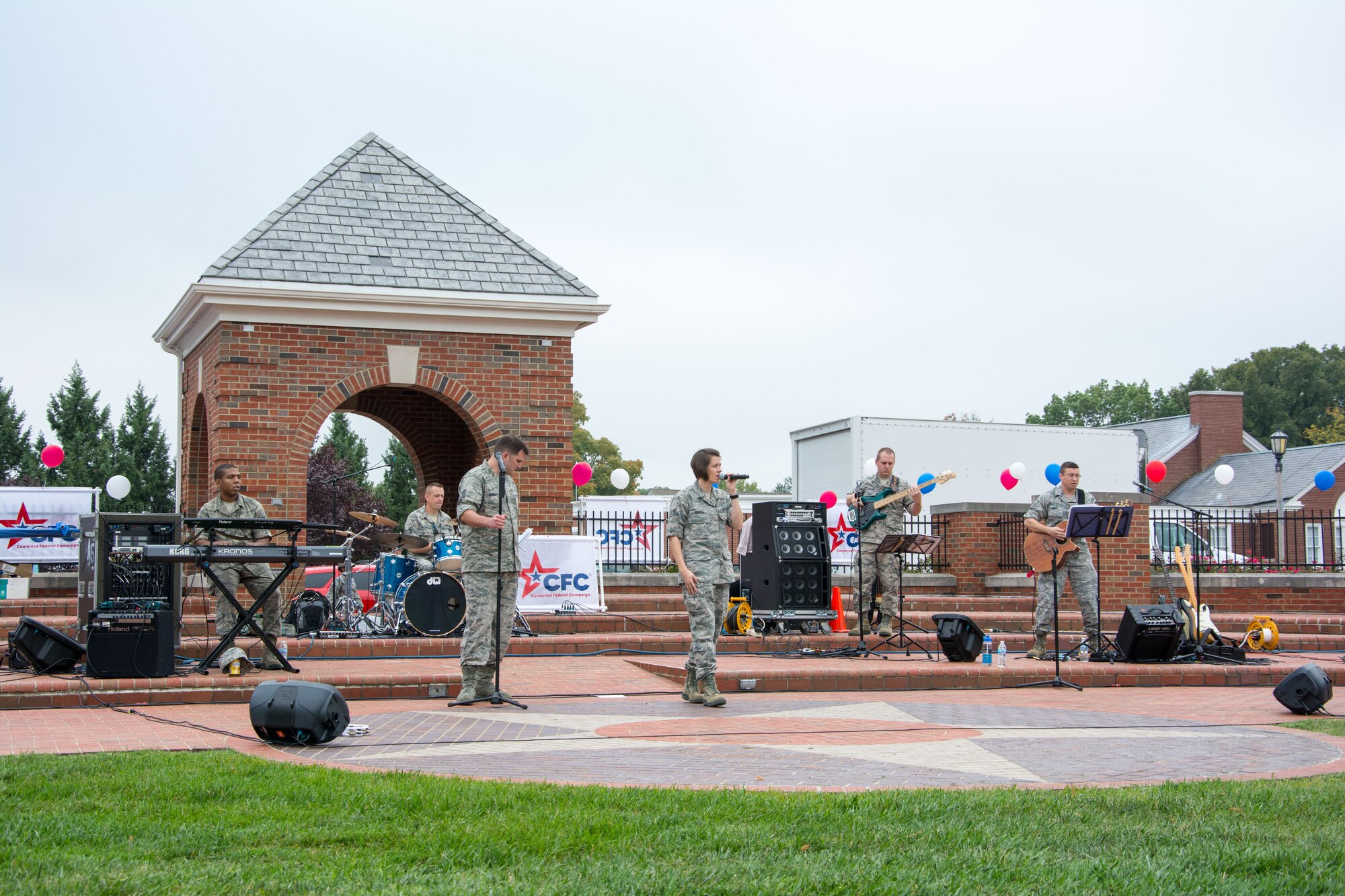 Air Force band 'Starlifter' performs during the Combined Federal Campaign kick-off event Oct. 1, 2013, Scott Air Force Base, Ill. The event had more than 140 volunteers from various charity organizations providing information to service members, their families and civilians. (U.S. Air Force photo/Staff Sgt. Jonathan Fowler)