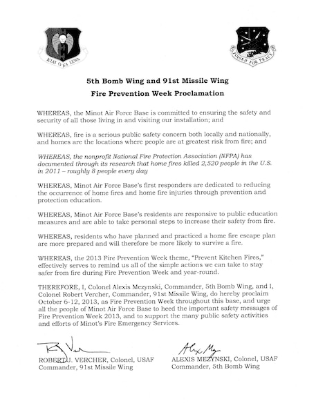Col. Alex Mezynski, 5th Bomb Wing commander, and Col. Robert Vercher, 91st Missile Wing commander, designated Oct. 6 -12 as Fire Prevention Week. In a proclamation signed by both commanders early September, they urged all at Minot Air Force Base to support the public safety activities hosted by the Fire Emergency Services during this time. (U.S. Air Force photo/Airman 1st Class Kristoffer Kaubisch)