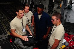 Airmen from the 437th Maintenance Squadron prepare to inspect a Globemaster C-17 Oct. 1, 2013, at Joint Base Charleston – Air Base, S.C. Staff Sgt. Aircraft maintenance engineers maintain and repair aircraft frames and mechanical parts. They use instruments to measure wear and test controls, replace defective components with hand tools, inspect their work to be sure it meets established standards and maintains records of actions. (U.S. Air Force photo/ Airman 1st Class Chacarra Neal)