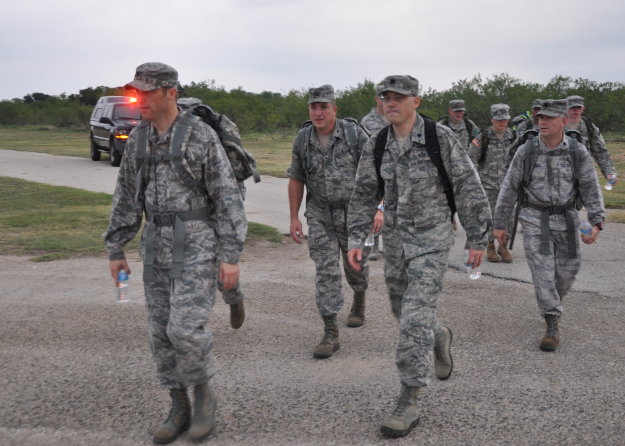 GOODFELLOW AIR FORCE BASE, Texas – Wing leadership turn off of Kiowa Trail marking the near completion of the Airman 1st Class Elizabeth Jacobson 4.1 Mile Remembrance Ruck March Sept. 28. A plaque with the likeness of Jacobson rests in front of the 17th Security Forces Squadron building and Goodfellow’s main gate bears her name. (U.S. Air Force photo/ Airman 1st Class Joshua Edwards)