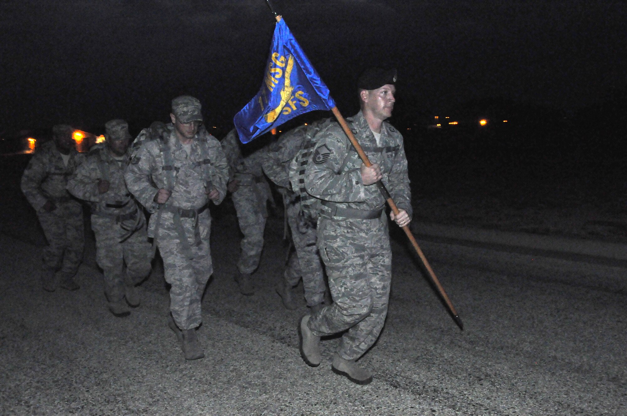 GOODFELLOW AIR FORCE BASE, Texas – Team Goodfellow members run during the Airman 1st Class Elizabeth Jacobson 4.1 Mile Remembrance Ruck March on Apache Trail Sept. 28. Each individual decided how much weight they wanted to carry in their rucksack. (U.S. Air Force photo/ Airman 1st Class Joshua Edwards)