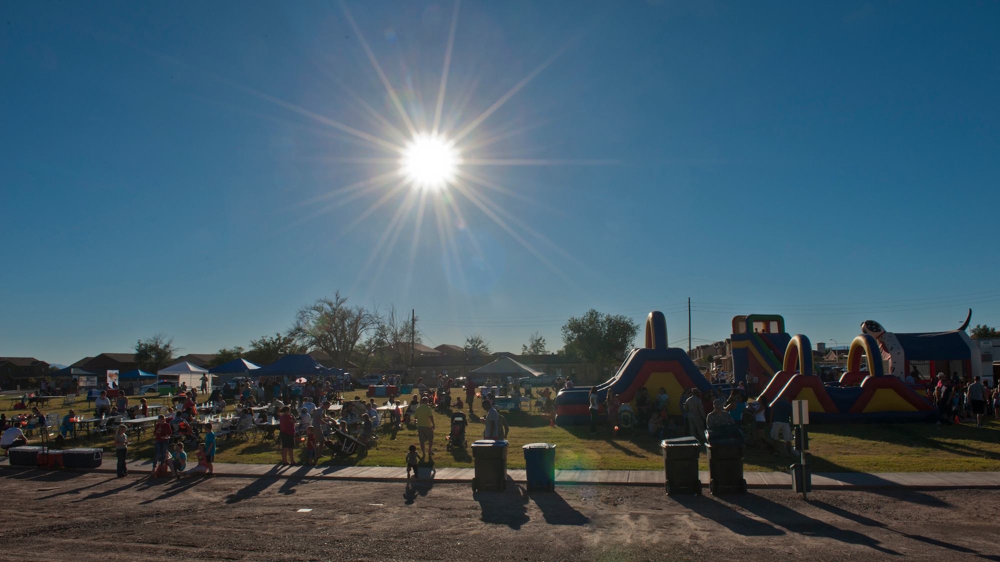Members of Team Holloman and Alamogordo residents participate in the annual National Night Out event hosted by Soaring Heights Communities at Holloman Air Force Base, N.M., Oct. 1. During the event, local vendors offered free food and beverages. Soaring Heights also set up activities for children and raffled off prizes. (U.S. Air Force photo by Airman 1st Class Aaron Montoya/Released)