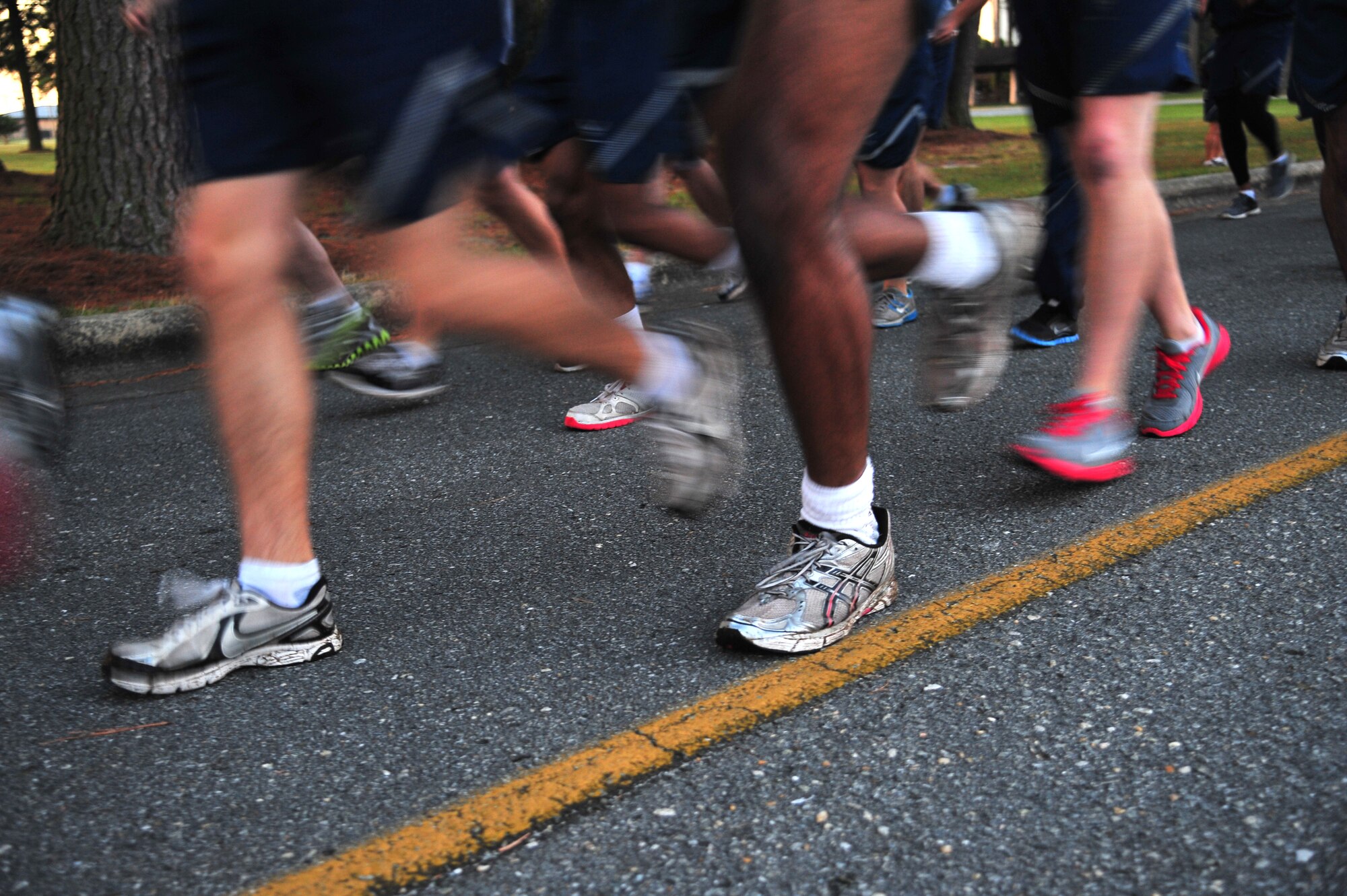 U.S. Air Force Airmen assigned to the 4th Fighter Wing participate in a wing run during Comprehensive Airman Fitness (CAF) Day, Sept. 30, 2013. The run promoted unity and helped reinforce the physical pillar of the CAF program. (U.S. Air Force photo by Senior Airman Aubrey White)