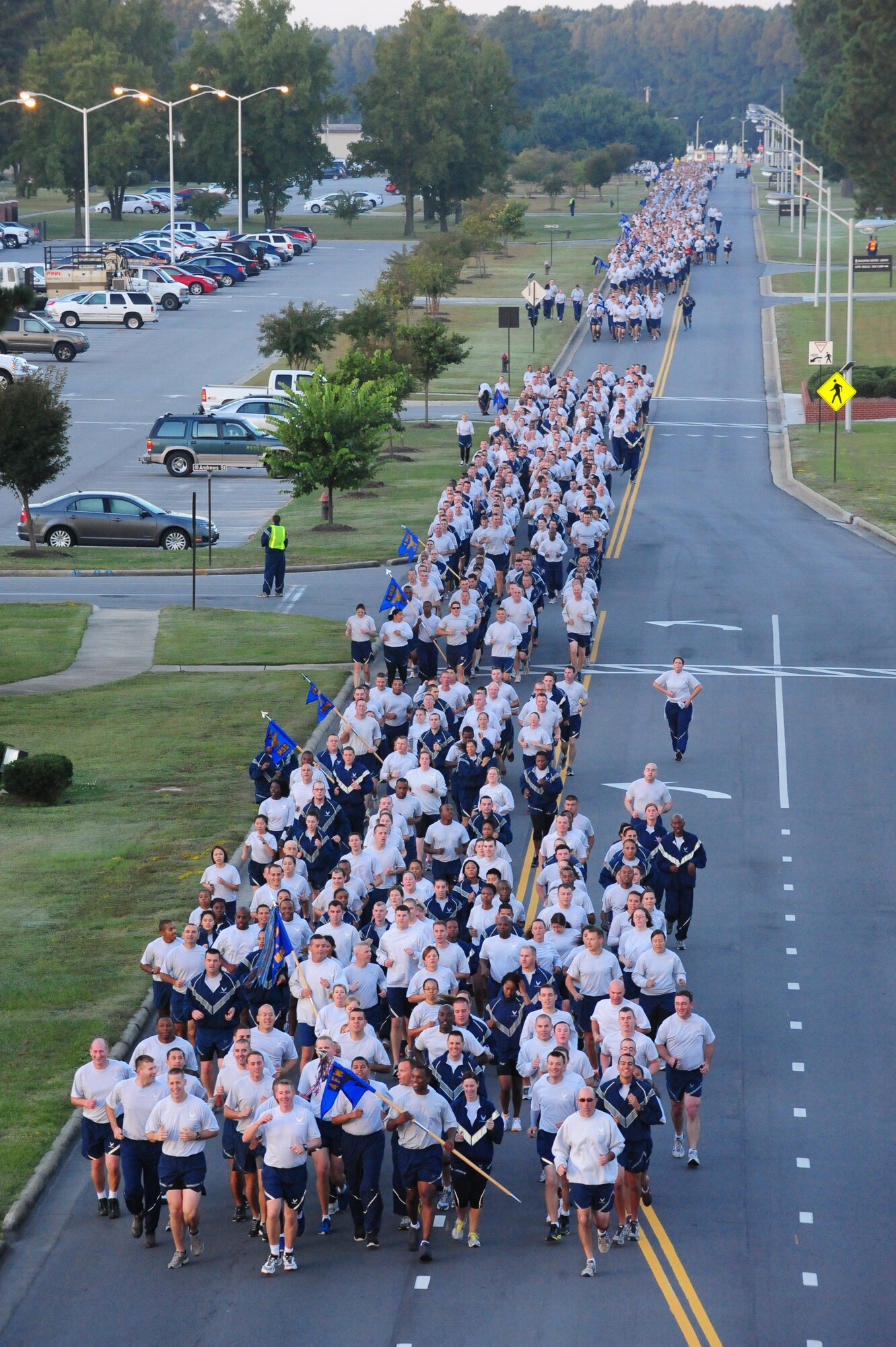 Members of the 4th Fighter Wing participate in a wing run during Comprehensive Airman Fitness (CAF) Day, Sept. 30, 2013. The day promoted resiliency and the CAF program, which aims to increase performance in the social, physical, mental and spiritual aspects of Airmen’s lives. (U.S. Air Force photo by Airman 1st Class Brittain Crolley/Released)