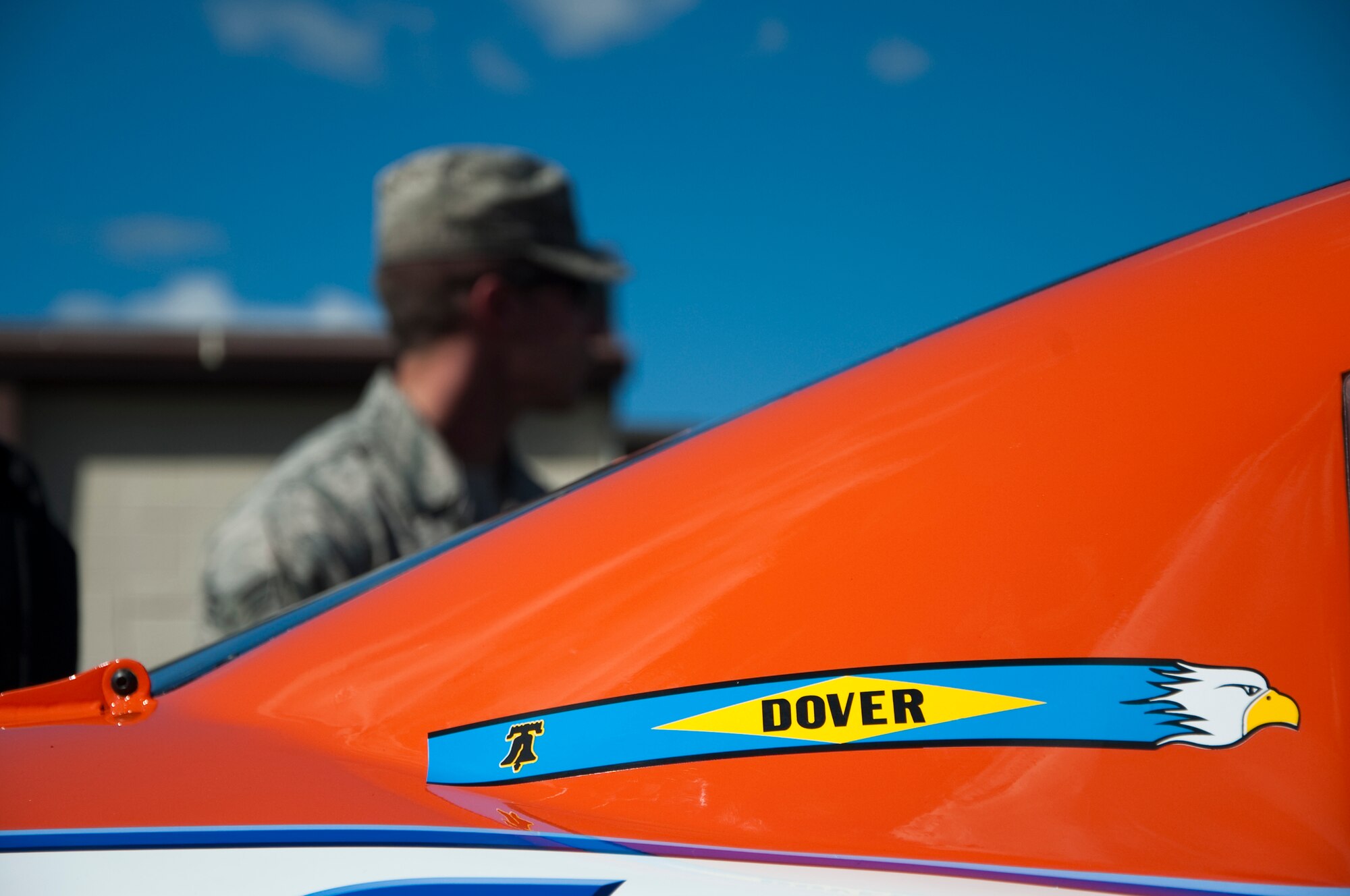 The Dover Air Force Base tail flash sits on Eric McClure’s No. 14 Hefty Chevy before the 5-Hour Energy 200 Sept. 28, 2013, at Dover International Speedway in Dover, Del. Team Dover Airmen served as honorary pit crew members for McClure and were able to watch the race from the pits. (U.S. Air Force photo/Senior Airman Jared Duhon)
 
