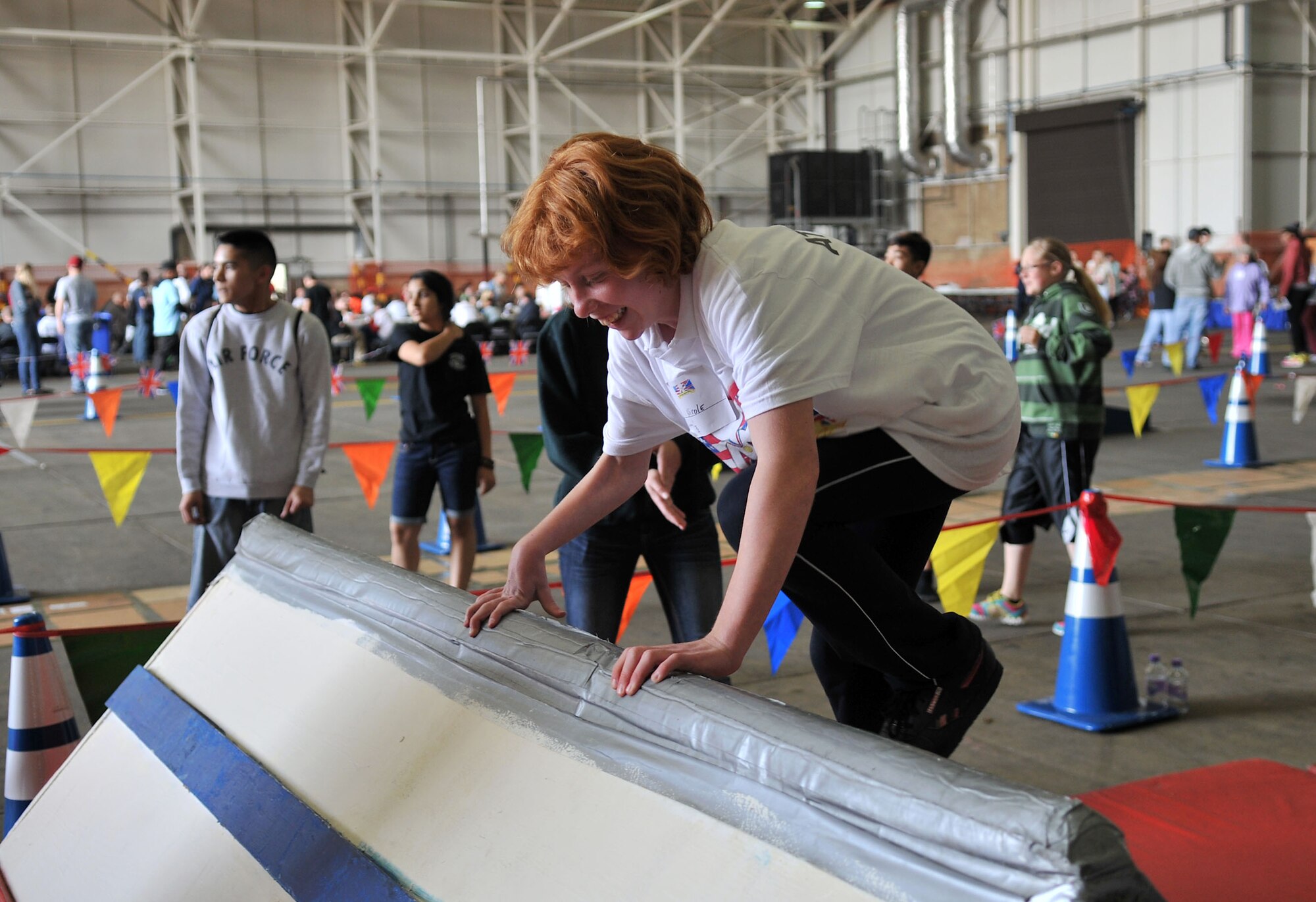 A Joan Mann Special Sports Day athlete completes an obstacle course Sept. 28, 2013 at RAF Mildenhall, England. JMSSD is an Olympic-styled event featuring a variety of sporting activities for more than 200 special-needs athletes from across England. (U.S. Air Force photo by Airman 1st Class Kyla Gifford/Released)