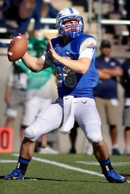 Sophomore quarterback Karson Roberts drops back for a pass in the second game of the season against Utah State at Falcon Stadium Sept. 7. Roberts rushed for a career-high 161 yards and two touchdowns in his first start in Saturday's game against Nevada. (U.S. Air Force Photo/Mike Kaplan)