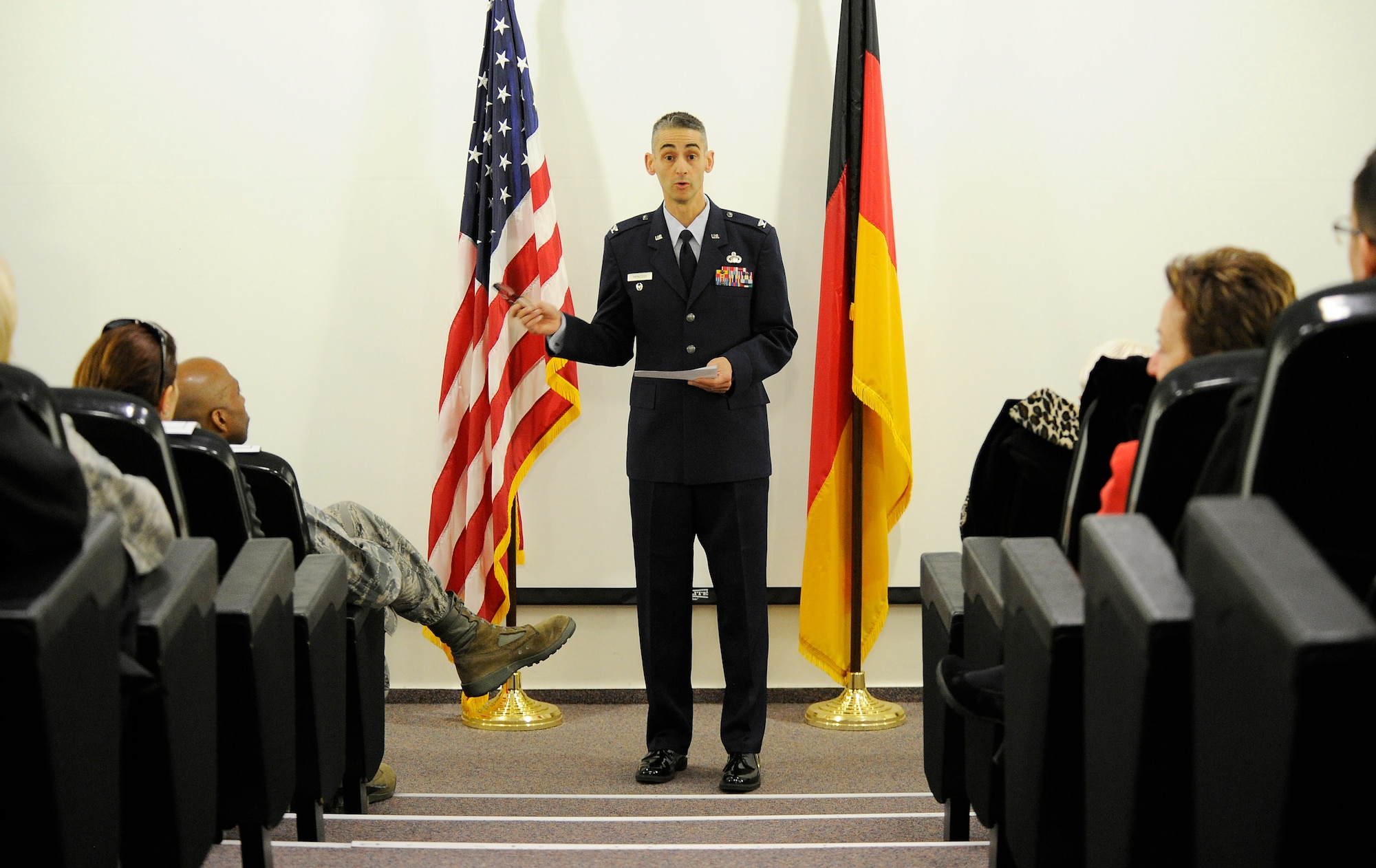 Col. Mario Troncoso, Air Force Installation Contracting Agency director, speaks to members of the 764th Specialized Contracting Squadron about the accomplishments of their new commander, Maj. Rachelle Osborn, during an activation ceremony at Ramstein Air Base, Germany Oct. 2, 2013. The 764th SCONS is a newly formed squadron that will provide contracting support to all of U.S. Air Forces Europe and Air Forces Africa bases for projects worth more than $2 million or if allocated money will be used at multiple locations. Osborn was previously in charge of the specialized contracting flight under the 700th Contracting Squadron. (U.S. Air Force photo/ Staff Sgt. Ryan Crane)