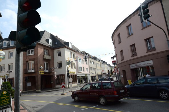 BITBURG, Germany --- Cars pass through a street intersection marked by temporary yellow lanes and non-working traffic lights Sept. 26, 2013. The Bitburg city council recently enacted an inner-city circle to alleviate traffic congestion. (U.S. Air Force photo illustration by Senior Airman Joe W. McFadden / Released)
