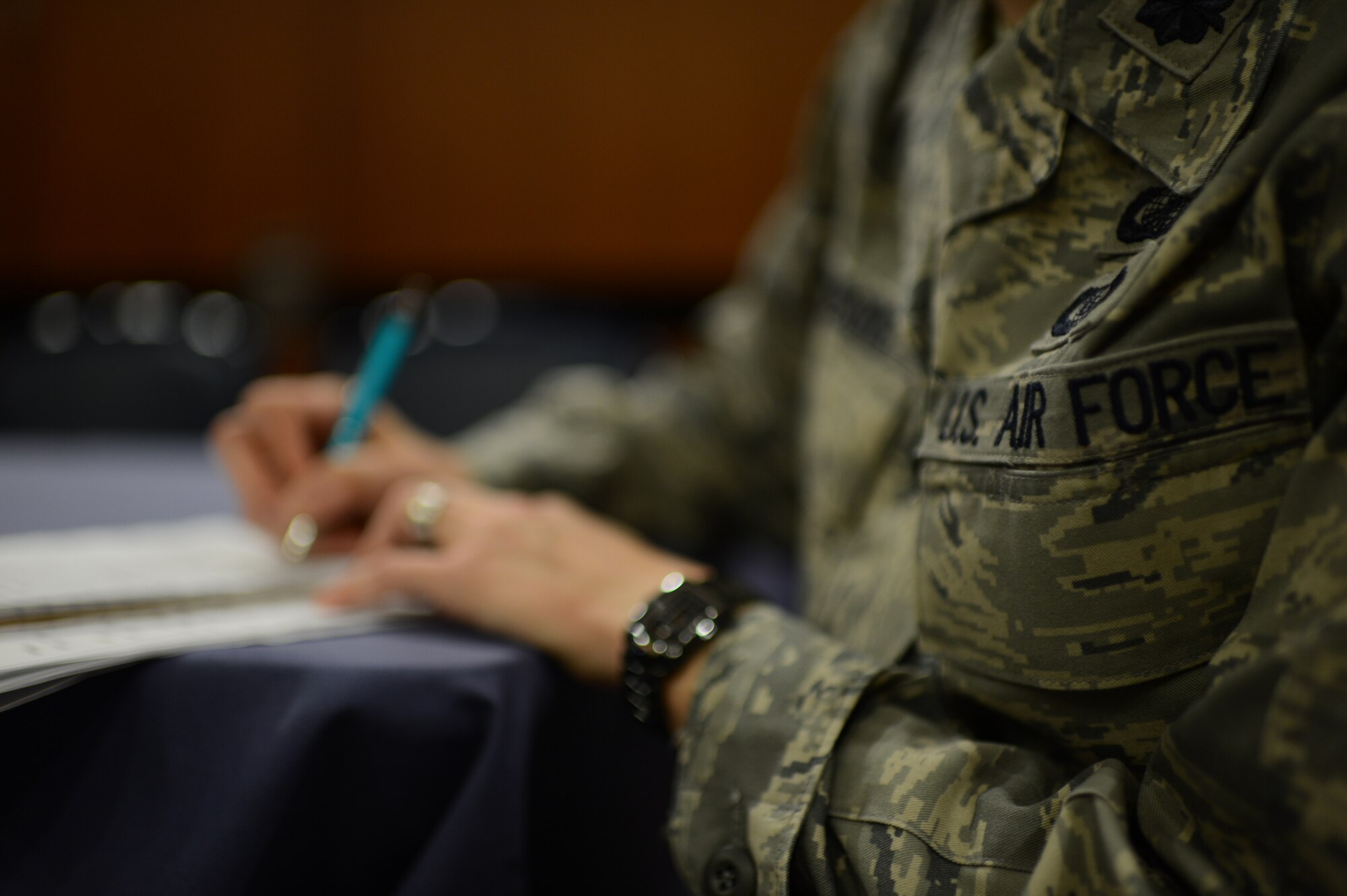 SPANGDAHLEM AIR BASE, Germany – A member from the Air Force Sexual Assault Prevention & Response Headquarters, located in the Pentagon, takes notes of comments and suggestions made by Spangdahlem Airmen in an Air Force-wide focus group in combating sexual assault Sept. 26, 2013. The mission of the groups was to hear what the Airmen think are the problems and how they think we can lessen these problems. (U.S. Air Force photo by Airman 1st Class Gustavo Castillo/Released)