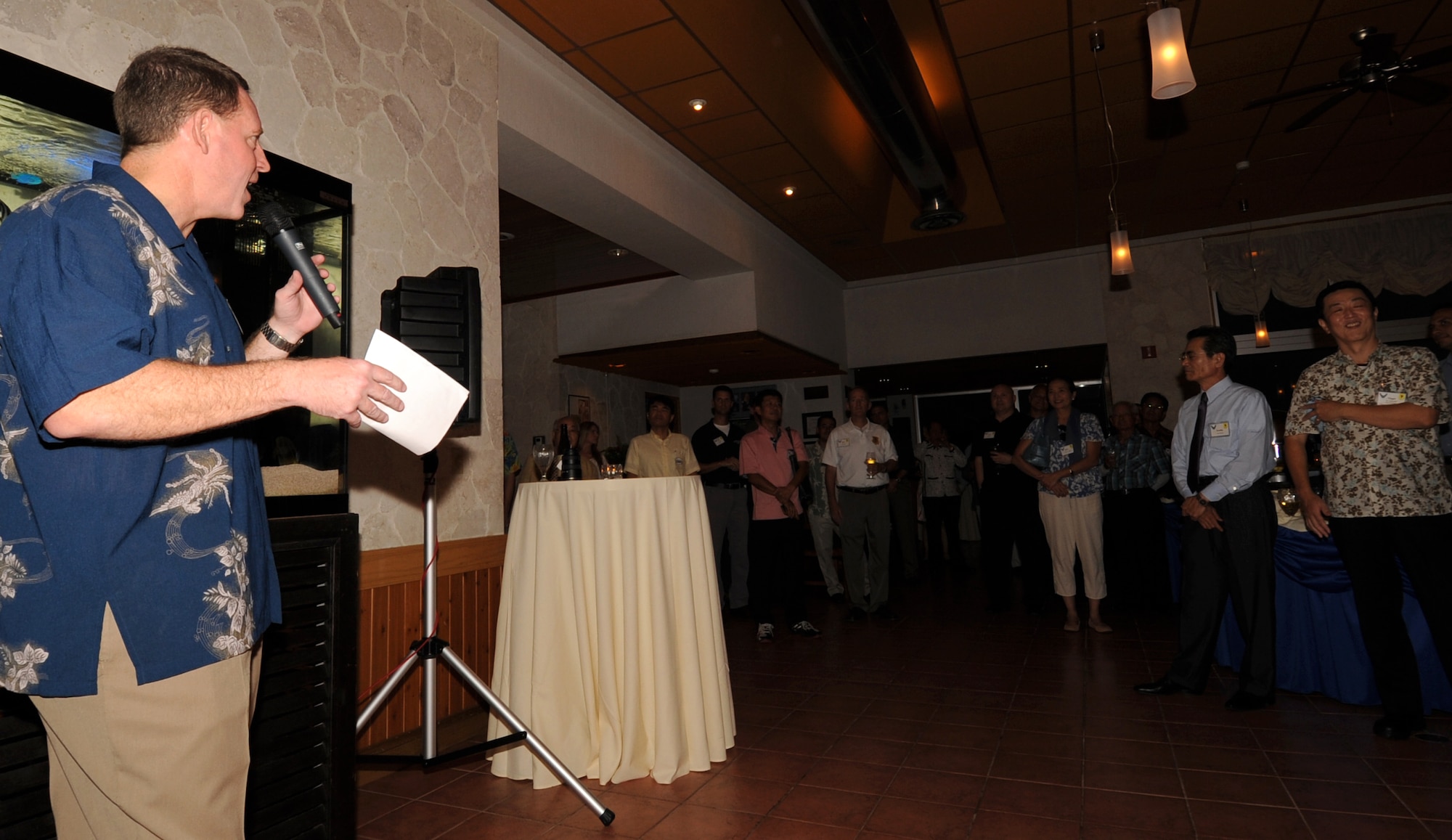 U.S. Air Force Brig. Gen. James Hecker, 18th Wing commander, speaks during an Honorary Commanders social event at the Kadena Marina seaside restaurant, Okinawa, Japan, Oct. 1, 2013. The event was held to reinforce ties between the U.S. military and the community, as well as give new commanders the opportunity to meet and greet their honorary commanders. (U.S. Air Force photo by Naoto Anazawa)