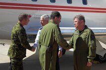 PETERSON AIR FORCE BASE, Colo.- The Canadian Chief of Defense Staff General Tom Lawson and the Canadian Forces Chief Warrant Officer, Chief Warrant Officer Kevin West shake hands with the North American Aerospace Defense Command (NORAD) Deputy Commander, Lieutenant-General Alain Parent and Gen. William L. Shelton, Commander, Air Force Space Command, during their arrival at Peterson Air Force Base, Colo.  The purpose of the visit was to meet with NORAD Commander General Jacoby, Deputy Commander Lieutenant-General Parent and other senior leaders in order to gain additional insight into and appreciation of the Commands' unique missions, capabilities and advancement in the previous year and understand critical issues facing NORAD and USNORTHCOM in today's security environment. (U.S. Air Force by Senior Airman Kendra Alba/ Released)