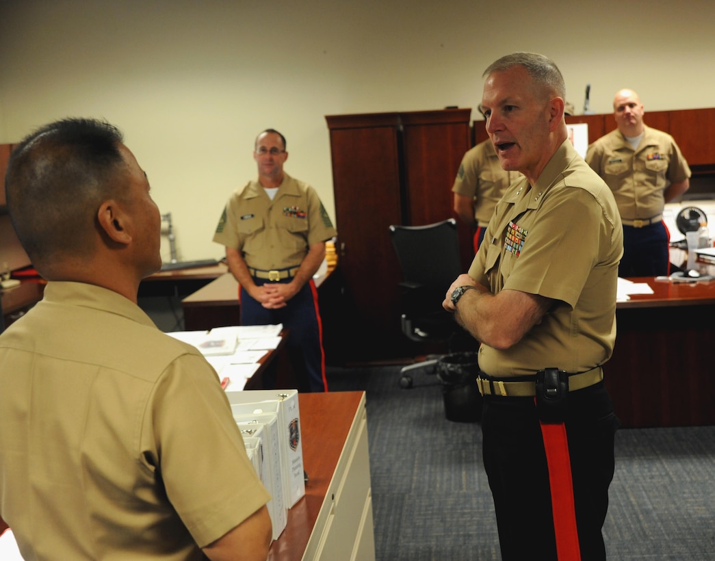 Marine Maj. Gen. Mark A. Brilakis, commanding general, Marine Corps Recruiting Command, meets and greets the operations office, at 8th Marine Corps District, Naval Air Station Fort Worth Joint Reserve Base, Texas, Oct. 2nd, 2013. Brilakis took command of the Western Recruiting Region on July 12th, 2013. 