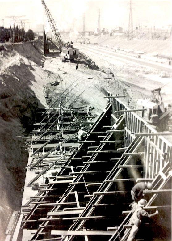 Upstream view of the Los Angeles River channel above Butte Street bridge during construction.