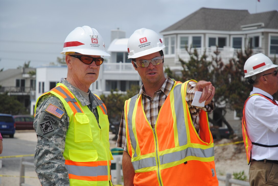 During a visit to New York and New Jersey July 2-3, 2013, Maj. Gen. Michael Walsh, Deputy Commanding General for Civil and Emergency Operations, receive an update on the Corps' Hurricane Sandy recovery and resiliency operations, including site visits to observe sand placement activities aimed at restoring coastal storm risk reduction projects. (Photo by Brandon Beach)