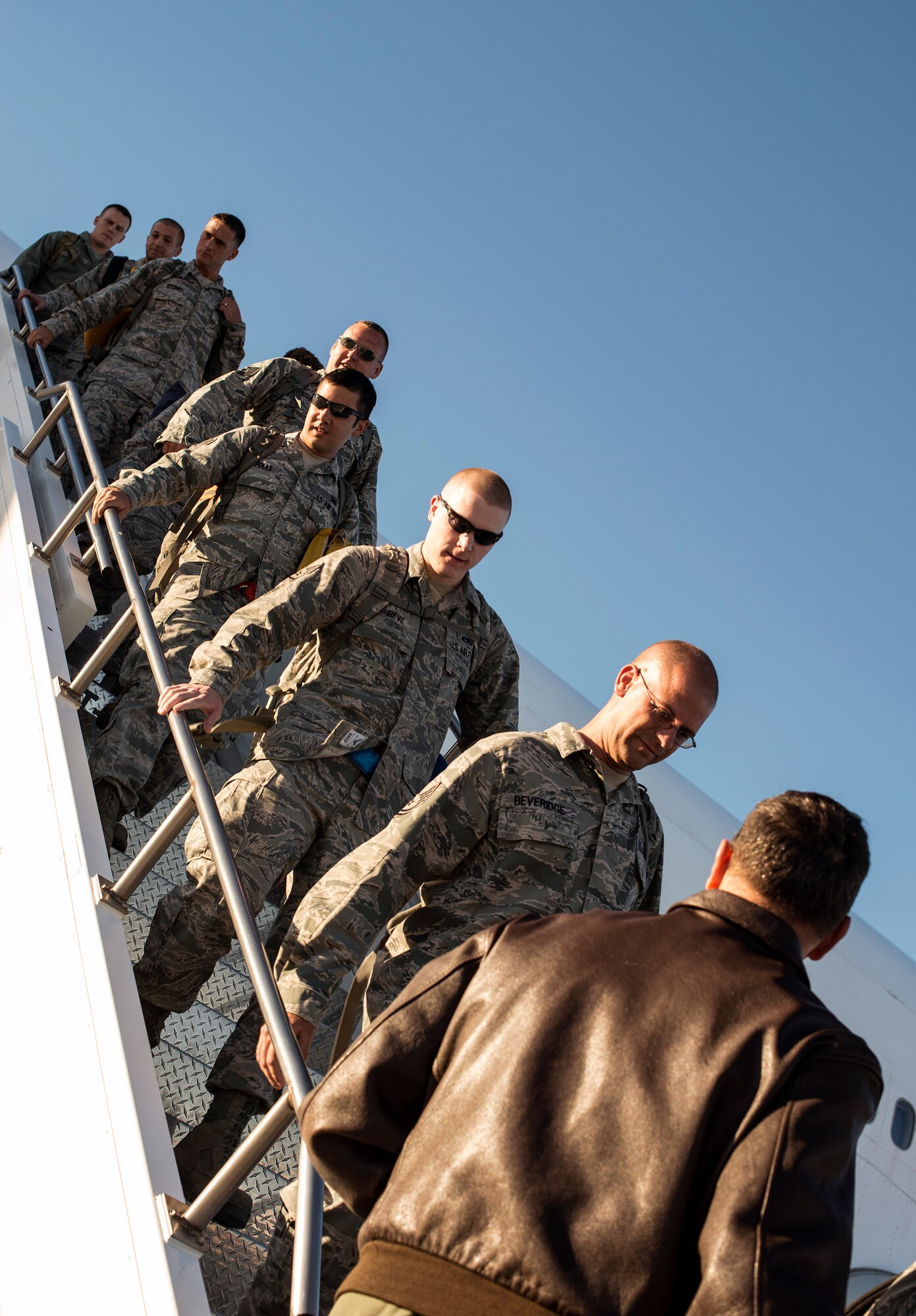 Airmen return to Mountain Home Air Force Base, Idaho, Oct. 3, 2013. They returned from a six-month deployment to Southwest Asia. (U.S. Air Force photo by Master Sgt. Kevin Wallace/RELEASED)