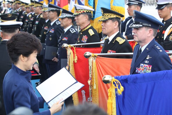 SEOUL AIR BASE, Republic of Korea - Republic of Korea President Park Geun-Hye presents the Korean Presidential Unit Citation to Lt. Gen. Jan-Marc Jouas, 7 Air Force commander, during the ROK Armed Forces Day celebration at Seoul Air Base, Republic of Korea, Oct. 1. Seventh Air Force received the award for longstanding achievements in operational readiness and force employment.The award was last issued to a U.S. unit in 2011 when the Army's 2nd Infantry Division was recognized for their support for Korea over the preceding 60 years. (ROK Ministry of National Defense photo)