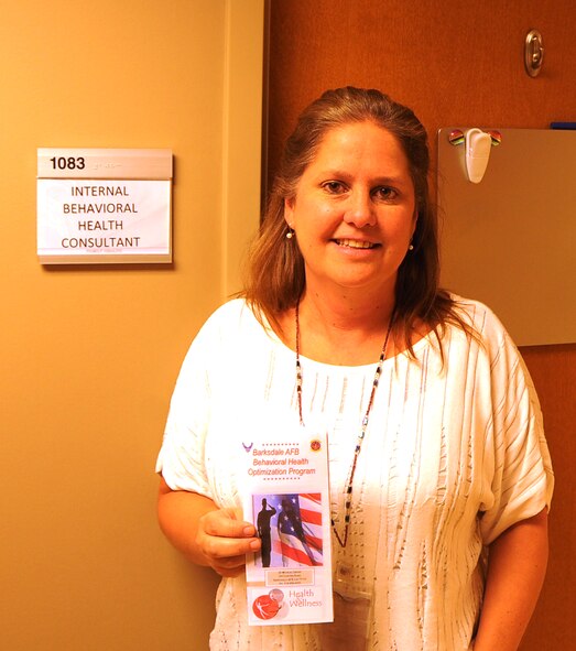 Shannon Grantham, 2nd Medical Operation Squadron behavioral health consultant, stands in front of her office on Barksdale Air Force Base, La., Oct. 2, 2013. Barksdale family clinic is one of 20 Air Force clinics that offer Behavioral Health Optimization Program services. This service gives Airmen, retirees and dependents focused interventions or help with issues such as: anxiety, depression, anger problems, sleep problems, grief and stress management.  (U.S. Air Force photo/Staff Sgt. Jason McCasland)