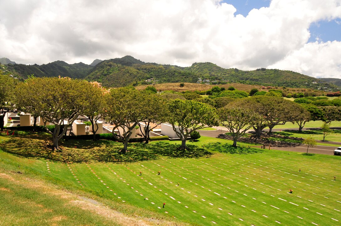 Members of the 134th Air Refueling Wing Civil Engineer Squadron and Public Affairs paid thier respects at  the National Memorial Cemetery of the Pacific better known as "The Punchbowl" during a deployment to Joint Base Pearl Harbor-Hickam, Hawaii  August 03-17.  (U.S. Air National Guard photo by Master Sgt. Kendra M Owenby/Released)