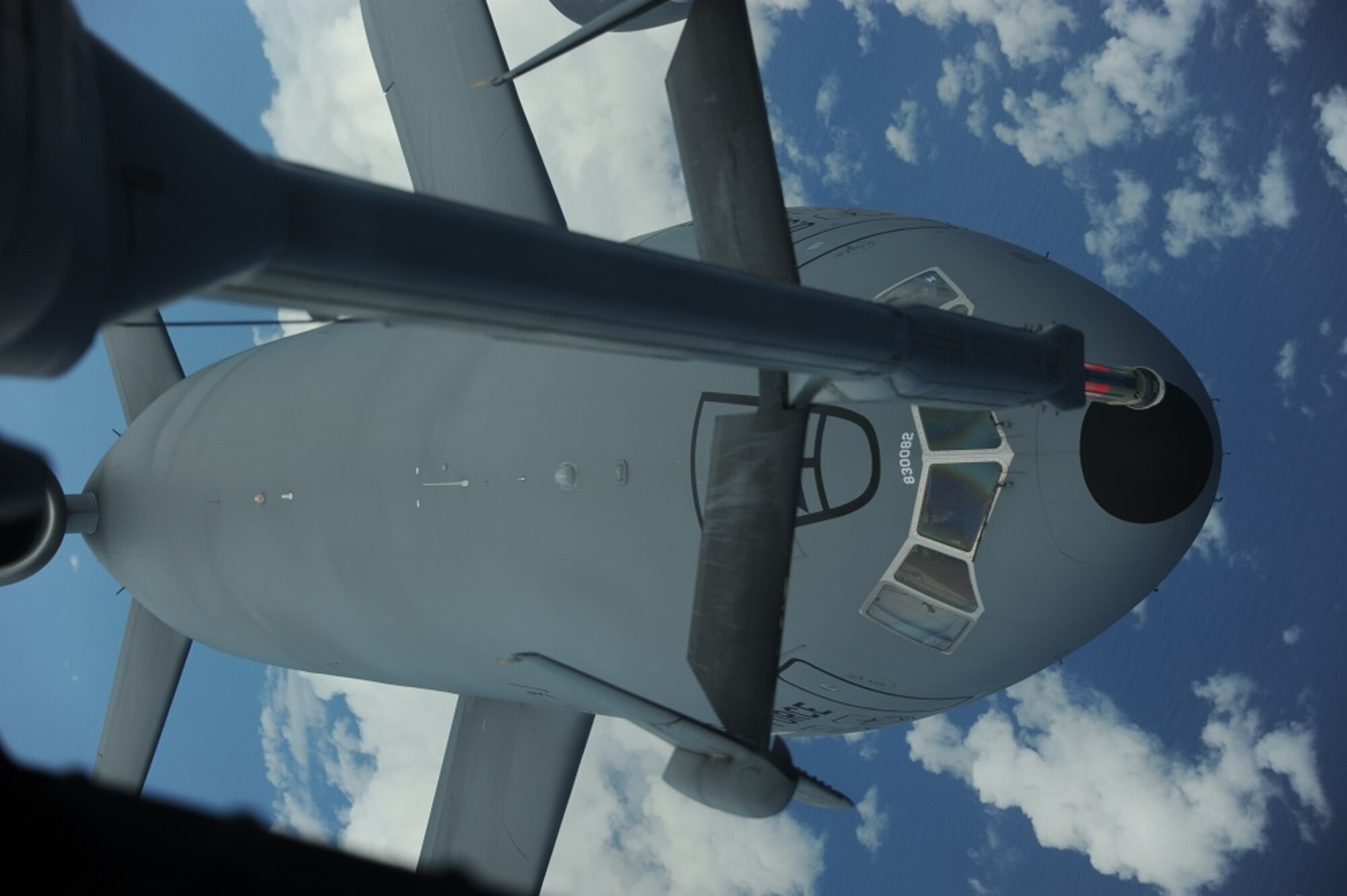 A KC-10 Extender from Joint Base McGuire-Dix-Lakehurst, N.J., approaches its position for air refueling during a 305th Operations Support Squadron Formal Training Unit training mission Sept. 13, 2013. FTU incorporates boom operators, pilots and flight engineers at JB MDL to give them hands on experience with their jobs. (U.S. Air Force photo by Airman 1st Class Sean M. Crowe/Released)