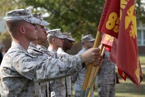 Four Marines with 8th Engineer Support Battalion, 2nd Marine Logistics Group hold the unit guidons following a battalion award ceremony aboard Camp Lejeune, N.C., Oct. 2, 2013. Brig. Gen. Edward D. Banta, the commanding general of 2nd MLG, presented the Marine Corps Engineer Association Engineer Support Battalion of the Year award to the unit. 