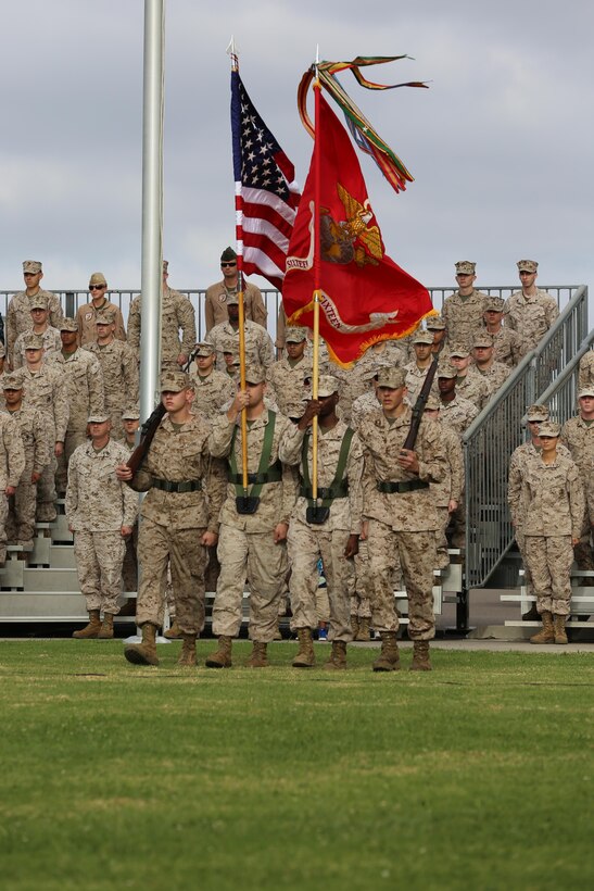 The color guard prepares to post the colors during an evening colors ceremony aboard Marine Corps Air Station Miramar, Calif., Oct. 3. The ceremony celebrated 238 years of naval traditions and heritage for the U.S. Navy.