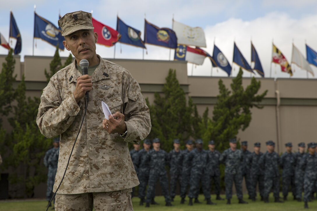 Command Master Chief Frank Dominguez, command master chief of I Marine Expeditionary Force (Forward), thanks the attendees during an evening colors ceremony aboard Marine Corps Air Station Miramar, Calif., Oct. 3. Dominguez went on to reflect on the direction of the service in recognition of the Navy’s 238th birthday.