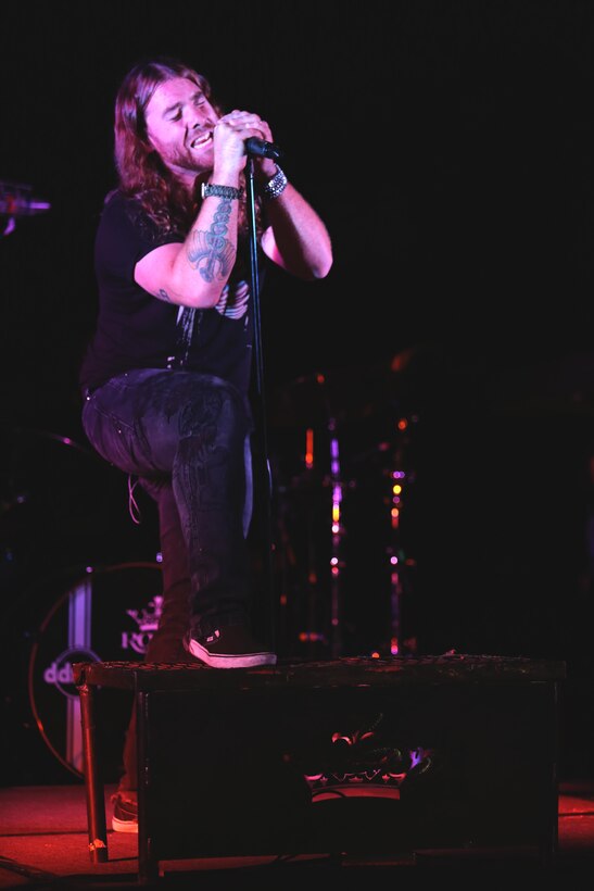 Neal Middleton, Royal Bliss lead vocalist and Salt Lake City native, performs for a crowd at the Officer’s Club aboard Marine Corps Air Station Miramar, Calif., Oct. 3. The band performed the free show to give back to military members for their service.
