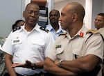 Army Maj. Gen. Errol R. Schwartz, commanding general of the District of Columbia National Guard, left, talks with Jamaican Defense Force Maj. Gen. Antony B. Anderson, JDF chief of defense staff, during a senior leaders exchange as part the D.C. Guard's partnership with the JDF through the National Guard Bureau's State Partnership Program. Anderson and members of his staff met with key leaders of the D.C. Guard and planned possible future subject matter expert exchanges.