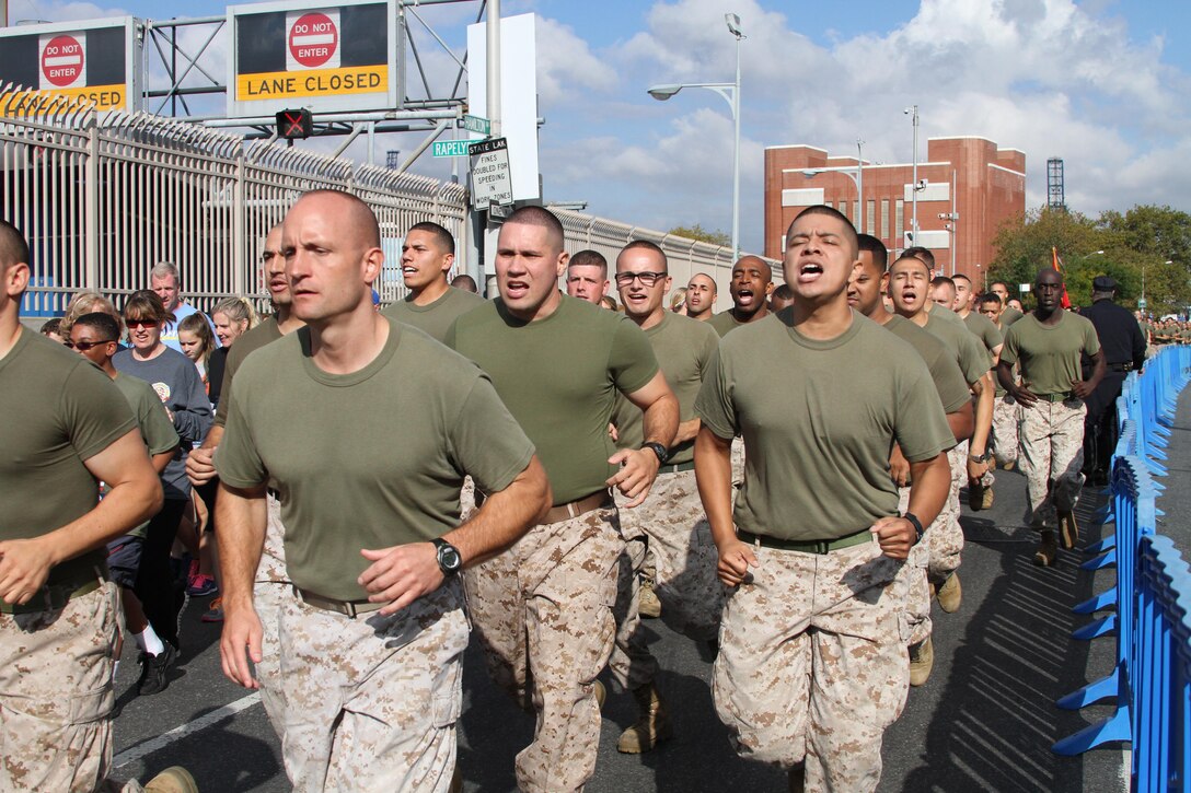 Staff Sgt. Luis Parreno, staff noncommissioned officer in charge of  Recruiting Substation Ridgewood, calls cadence during the Tunnel to Towers run from Brooklyn to Manhattan Sept. 29.  Tunnel to Towers, a 5-kilometer run, is held annually in honor of firefighter Stephen Siller.  Siller, who ran to the World Trade Center through the Battery Tunnel with all his gear on during the attacks on 9/11, ultimately lost his life during his attempt to save others.  (U.S. Marine Corps photo by Sgt. Kristin Moreno).