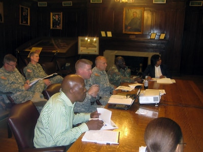 Army Lt. Col. Kaarlo Hietala, deputy director of logistics for the New York Army National Guard, and other logistic support leaders, shares some best practices with members of the South African Defense Force logistics team during a visit by the South Africans to the New York Army National Guard's Lexington Avenue Armory in New York July 3, 2012. The engagement was part of the New York Guard's partnership with the Republic of South Africa through the National Guard Bureau's State Partnership Program.