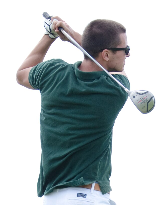 Petty Officer 3rd Class Nicholas Brown, yeoman, Helicopter Anti-Submarine Squadron Light 37, follows through on his swing after taking his turn during the CommanderÕs Cup Golf Classic, Sept. 27, 2013. (U.S. Marine Corps photo by Kristen Wong)